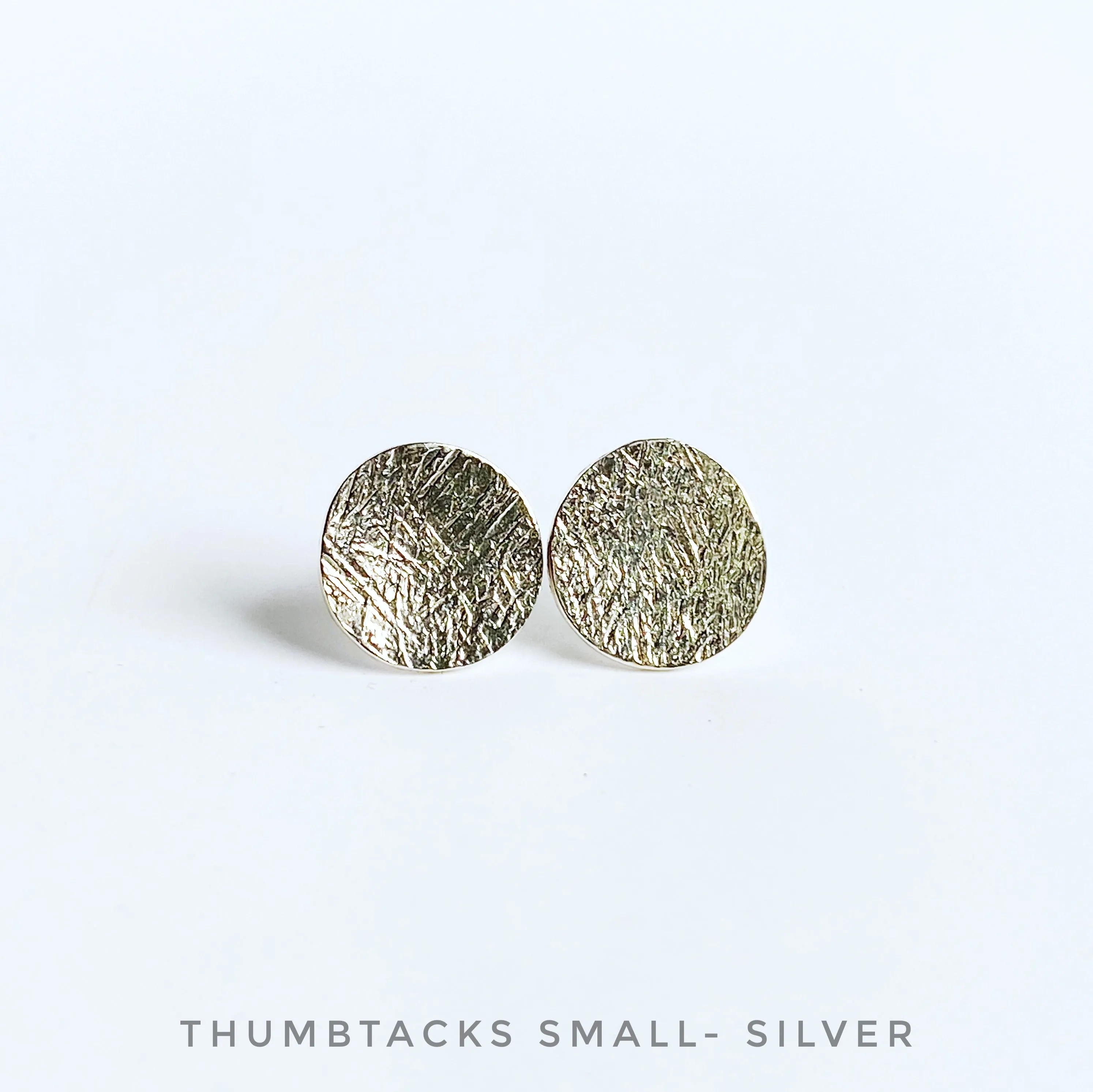 Thumbtack stud earrings